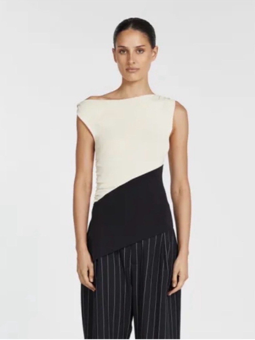 DISSH Two-Tone Asymmetrical Sleeveless Top in Ivory and Black